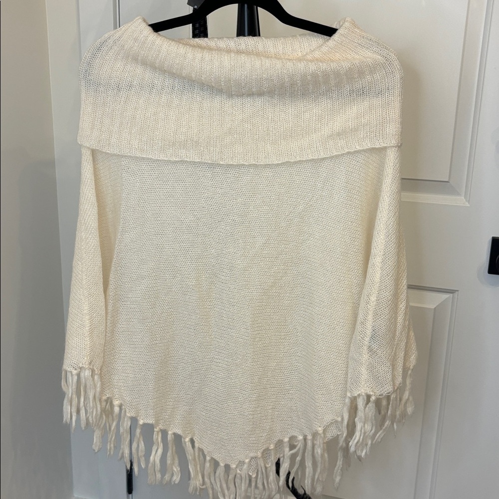 Elegant Cream Knit Sweater with Fringe